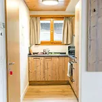 First Apartment - Aare Jungfrau Ag