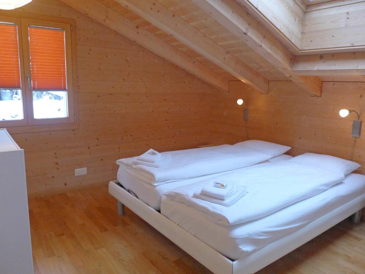 Apartment Chalet Almisgaessli By Interhome