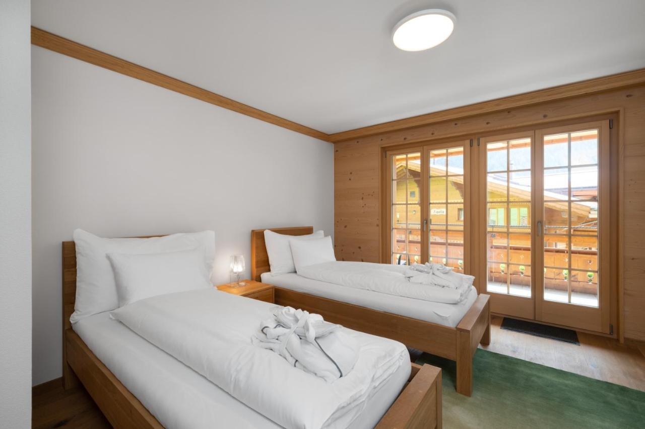 Chalé Chalet Alia And Apartments-grindelwald By Swiss